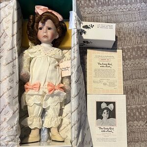 Vintage 'The Little Girl with a Curl' Porcelain Doll